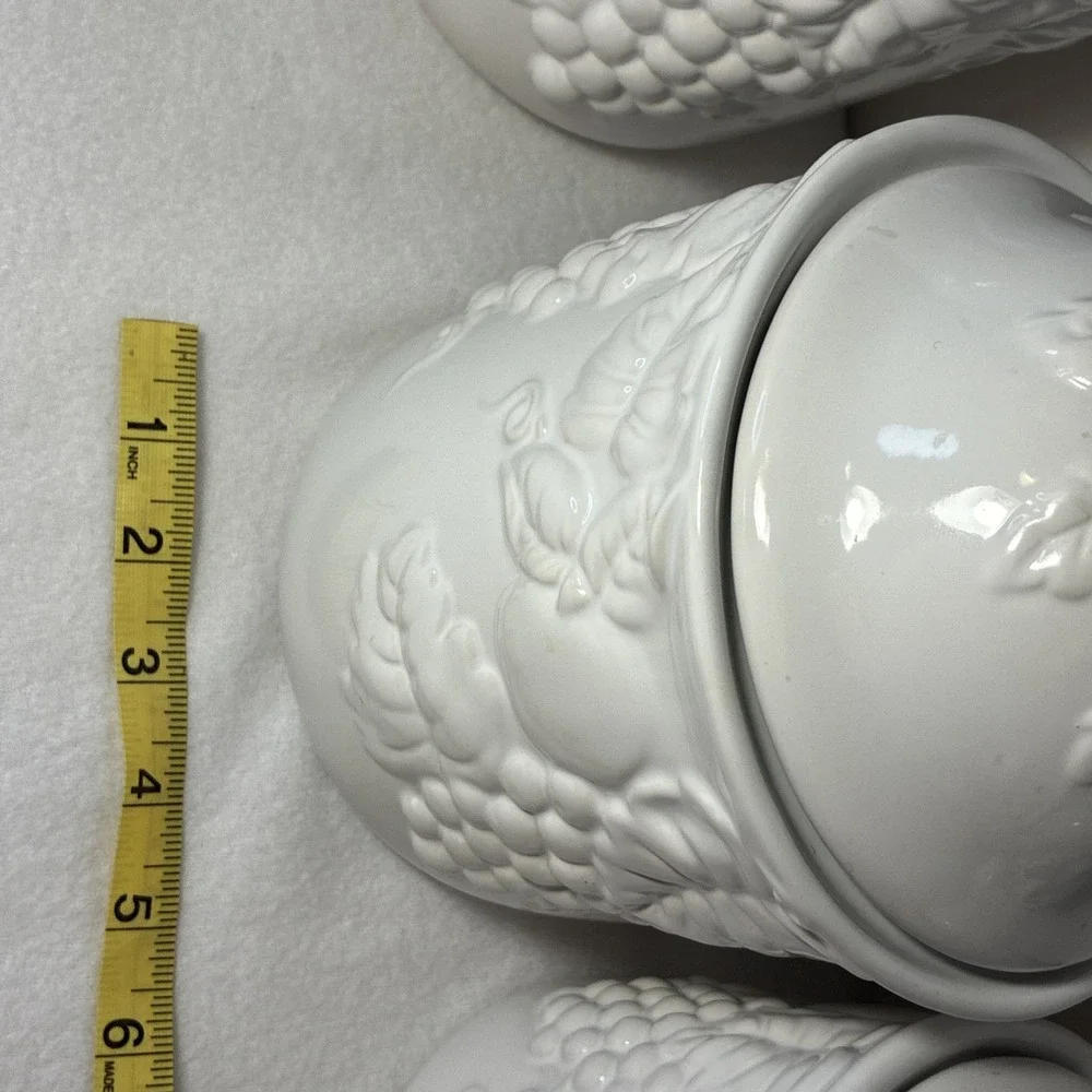Set of  4 Vintage White Lidded Ceramic Canisters,  Grapevine and Strawberry Lid.